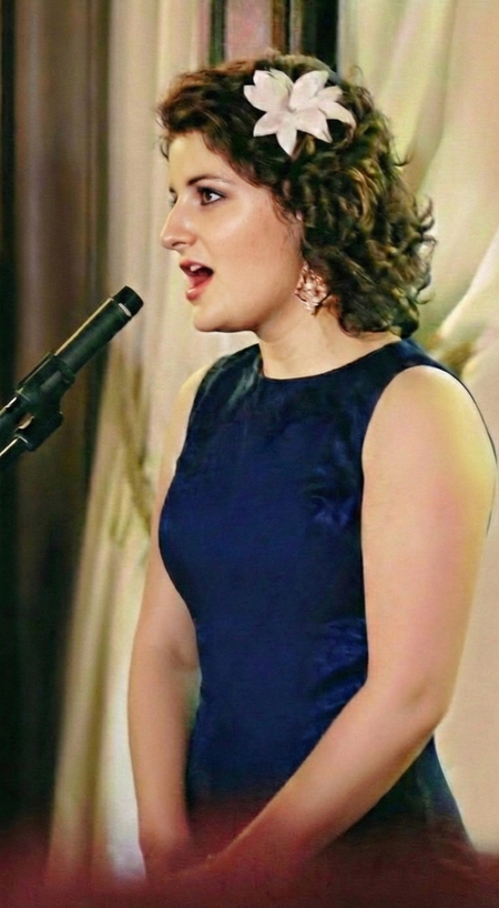 Tess signing after a performance